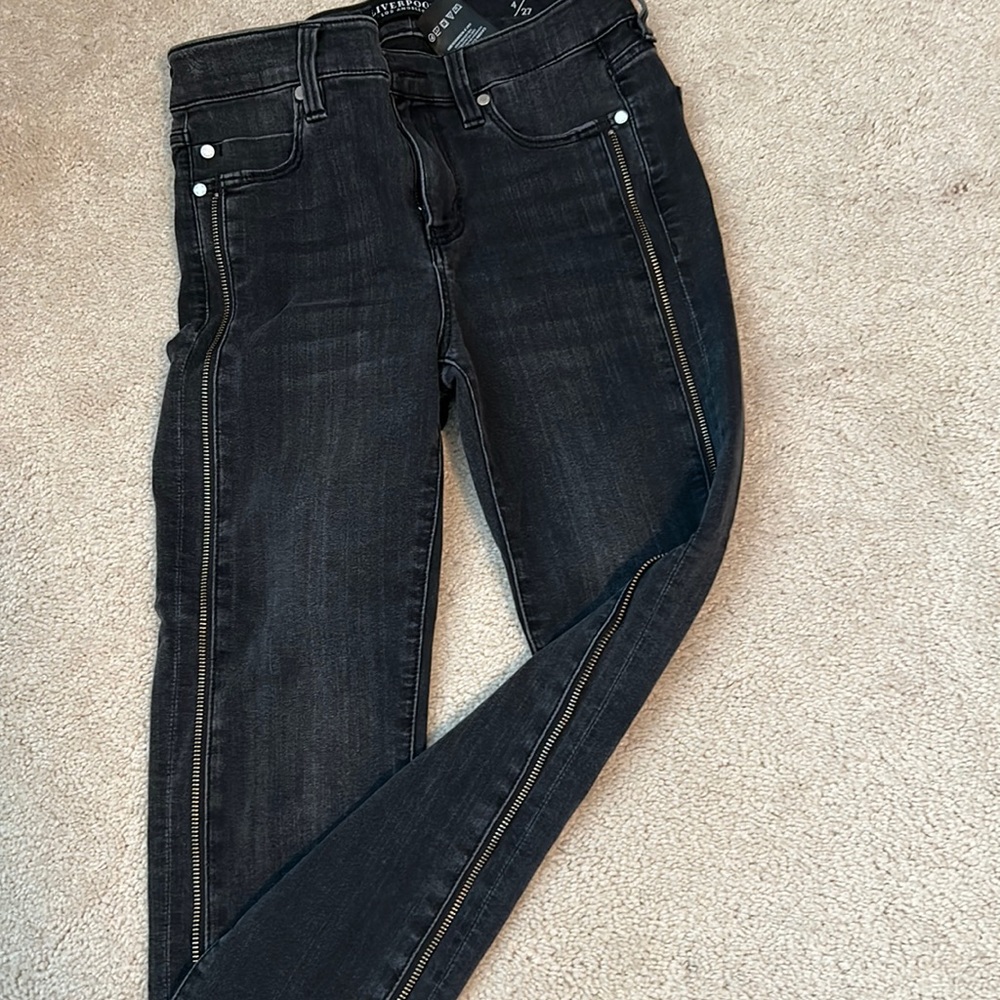 Jeans with zipper stitching down sides